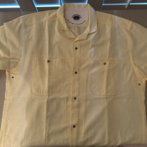 From Bass Pro shop. Men's Light Yellow Casual Button Down Shirt. Short Sleeve.